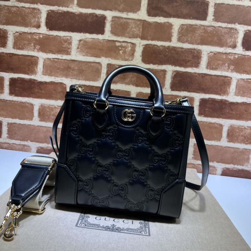 G*u*i top handle bags